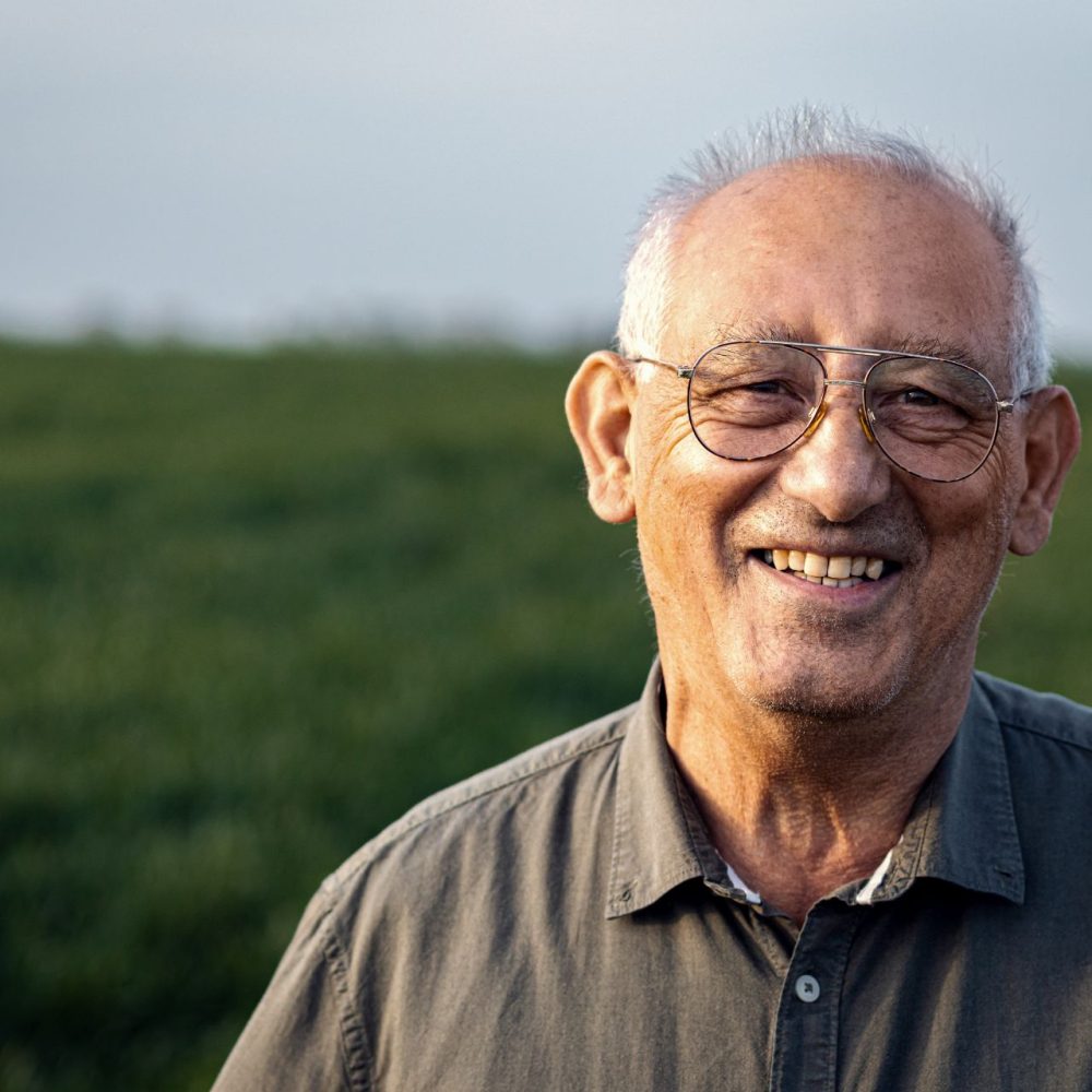 portrait-of-senior-farmer-standing-in-wheat-field-2024-04-16-00-31-58-utc (1)